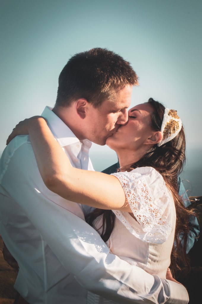 Just married couple kissing