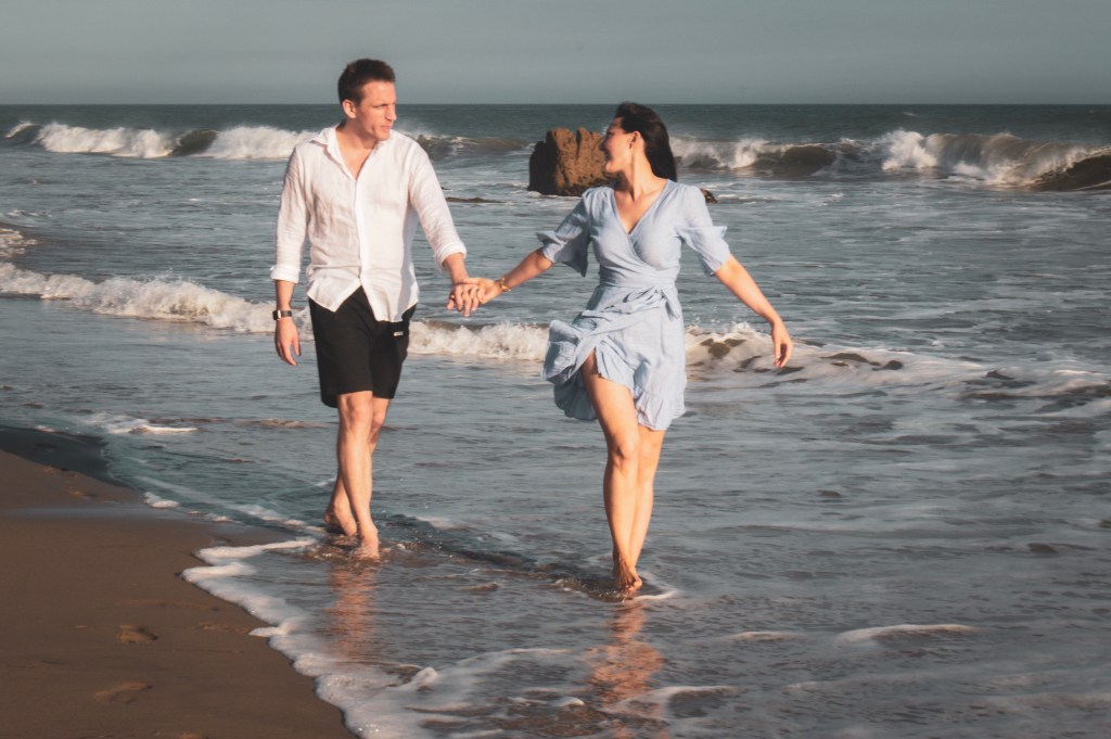 Couple walking on the beach