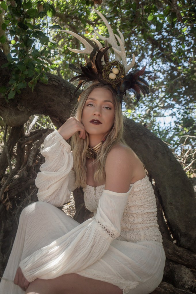Woman underneath an oak tree