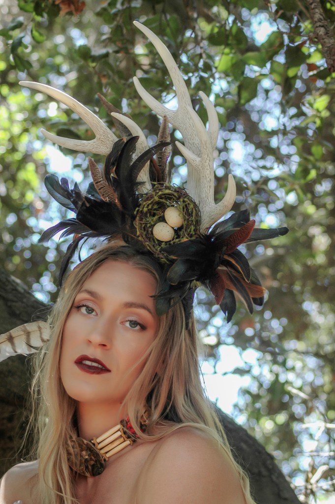 Portrait of a woman under a oak tree
